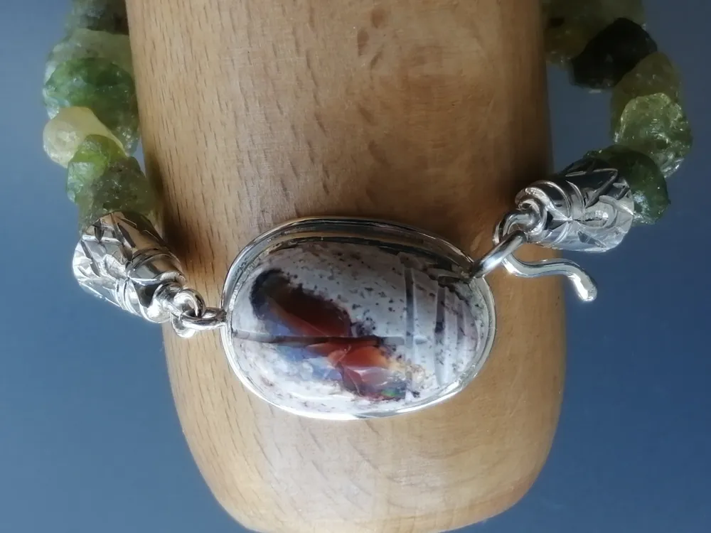 Armband in Silber mit Feueropal und Demantoid