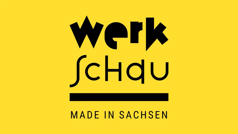 KREATIVES SACHSEN Gelber Hintergrund mit schwarzer Schrift, Logo: Werkschau Made in Sachsen